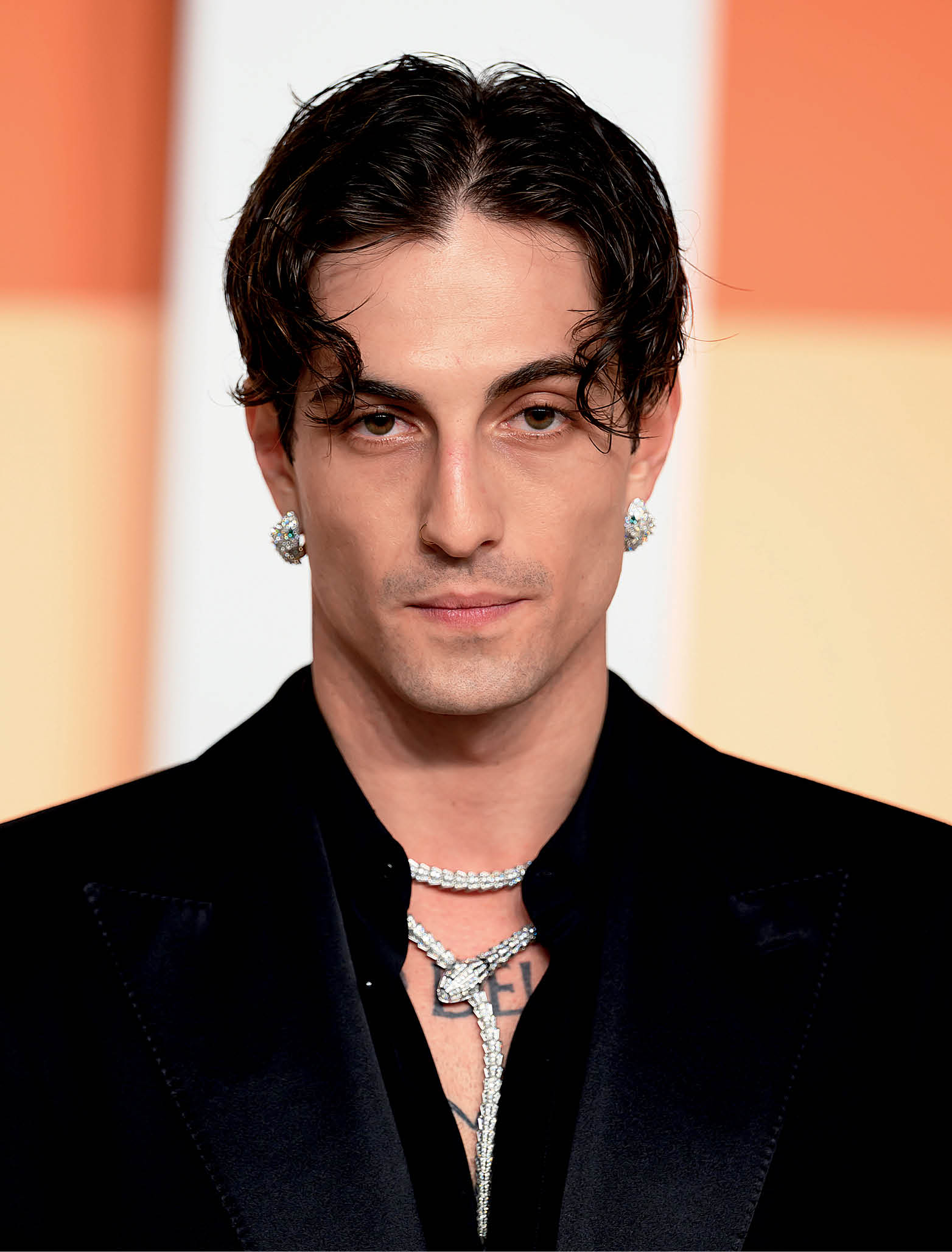 Damiano David (right) at the 2025 Vanity Fair Oscar Party;