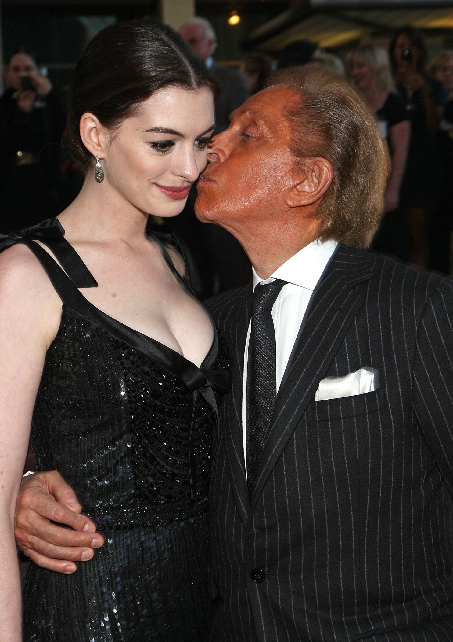 Actress Anne Hathaway and designer Valentino Garavani arrive at the L.A. premiere of "Valentino: The Last Emperor" held at the L.A. County Museum of Art on April 1, 2009 in Los Angeles, California.