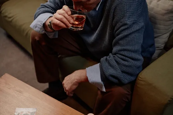 elderly-man-wearing-blue-sweater-600nw-2597062081