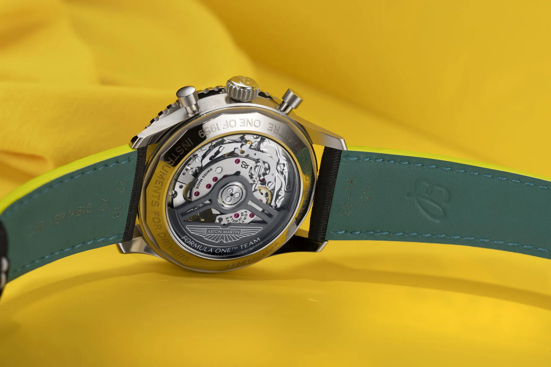 03_Breitling_Navitimer_B01_Chronograph_43_Aston_Martin_Aramco_Formula_OneTM_Team_RGB_optimized_650