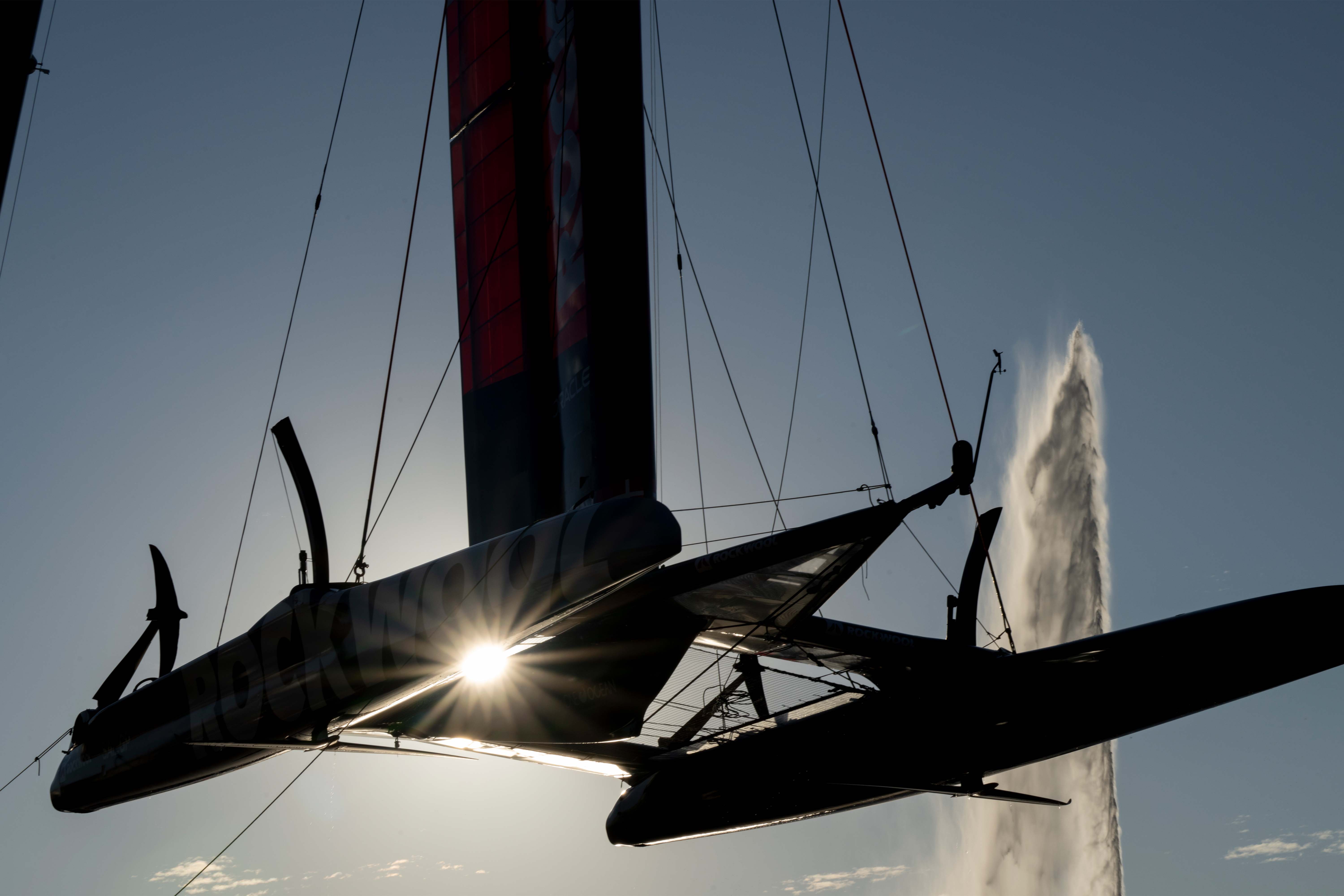 THE F50 CATAMARAN BEING CRANED IN FRONT OF THE JET D'EAU ON LAKE GENEVA © Rolex,Ricardo Pinto for SailGP
