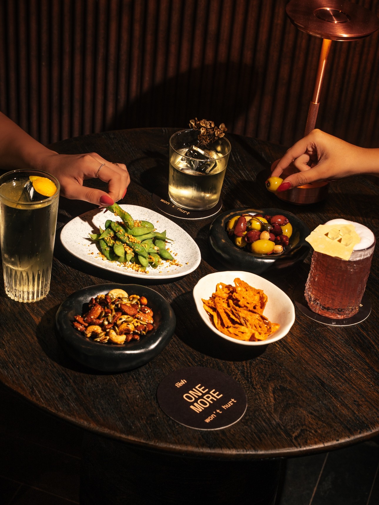 Bar Bites- Crispy Lotus Stem Smoked BBQ Rub, Spiced Nuts Rosemary, Crunchy Chickpeas, Marinated Olives Mahua Flowers Caperberries, Steamed Edamame with Fried Garlic (1)