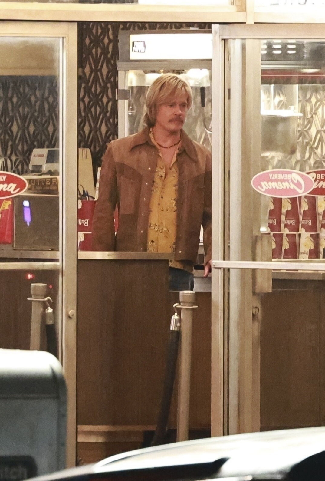 Brad Pitt as Cliff Booth on the set of The Adventures of Cliff Booth